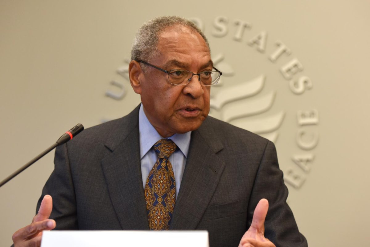 Former ambassador George Moose speaks at a U.S. Institute of Peace event. 