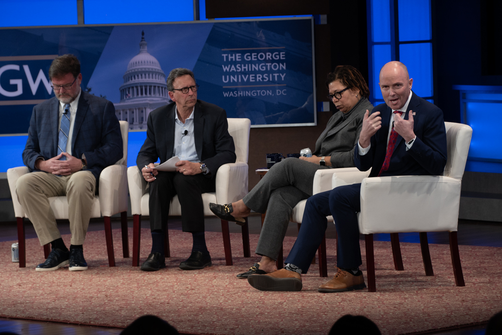 Throughout the rest of the event, 
from left to right, columnist Jonah Goldberg, professor Frank Sesno, journalist Michel Martin and Gov. Spencer Cox (R-Utah) discussed civil discourse, climate change, transgender rights and misinformation at an event Wednesday. 