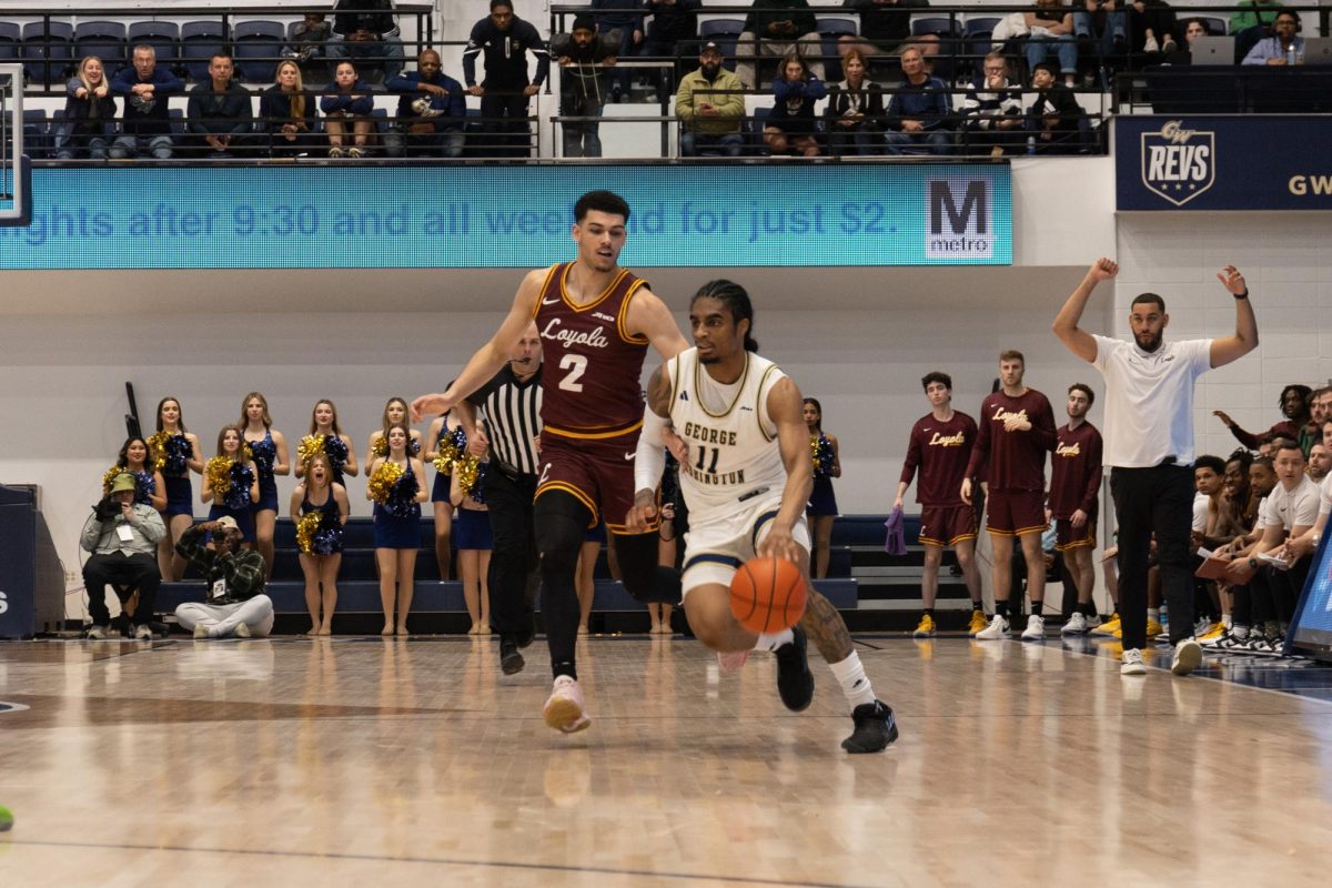 Senior guard James Bishop IV cuts through the court during the game against Loyola Chicago.