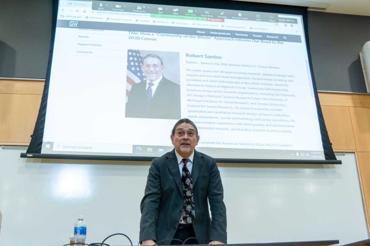 Robert Santos, the 26th director of the U.S. Census Bureau since 2022, speaks to students at Ames Hall on Friday. 