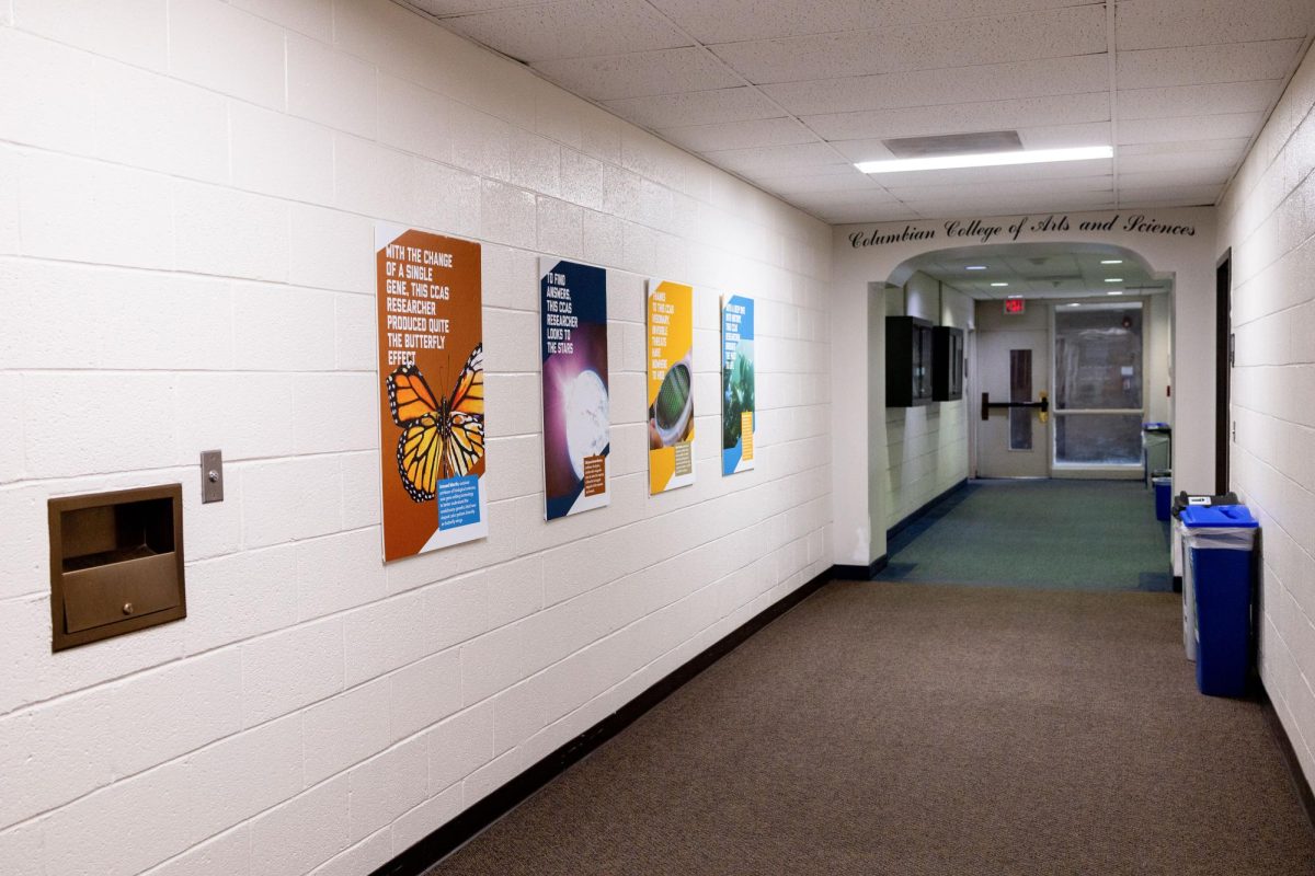 Promotional posters for the Columbian College of Arts and Sciences lay along the wall of the 2nd floor hallway in Phillips Hall.