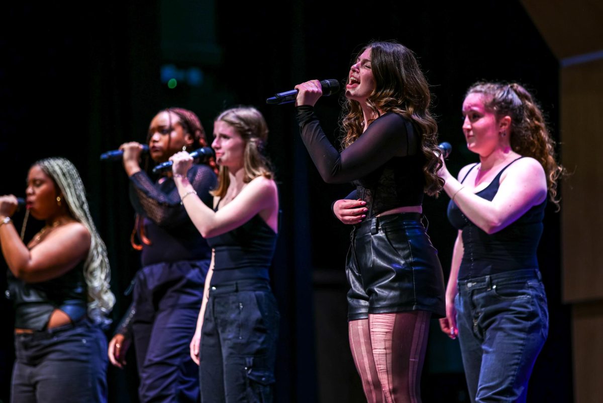 The GW Pitches harmonize during their set at an international a capella competition. 