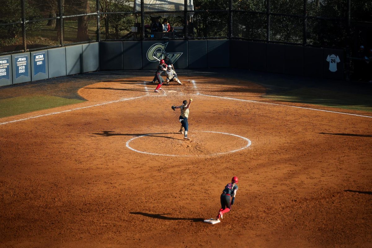A GW pitcher throws during their game against Stony Brook University on Sunday.