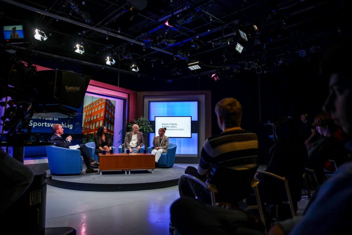 From left to right, NBC News Chief Political Analyst Chuck Todd, Professors Kelsey Nelson and William Youmans, and sophomore Avril Silva speak at the panel on sportswashing.