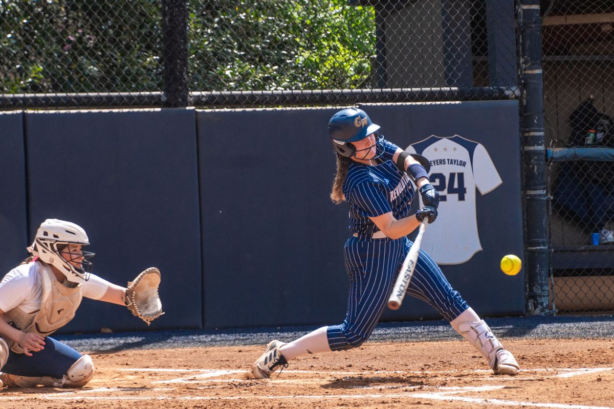 Senior right-fielder Alexa Williams swings at a pitch in a game against Coppin State.