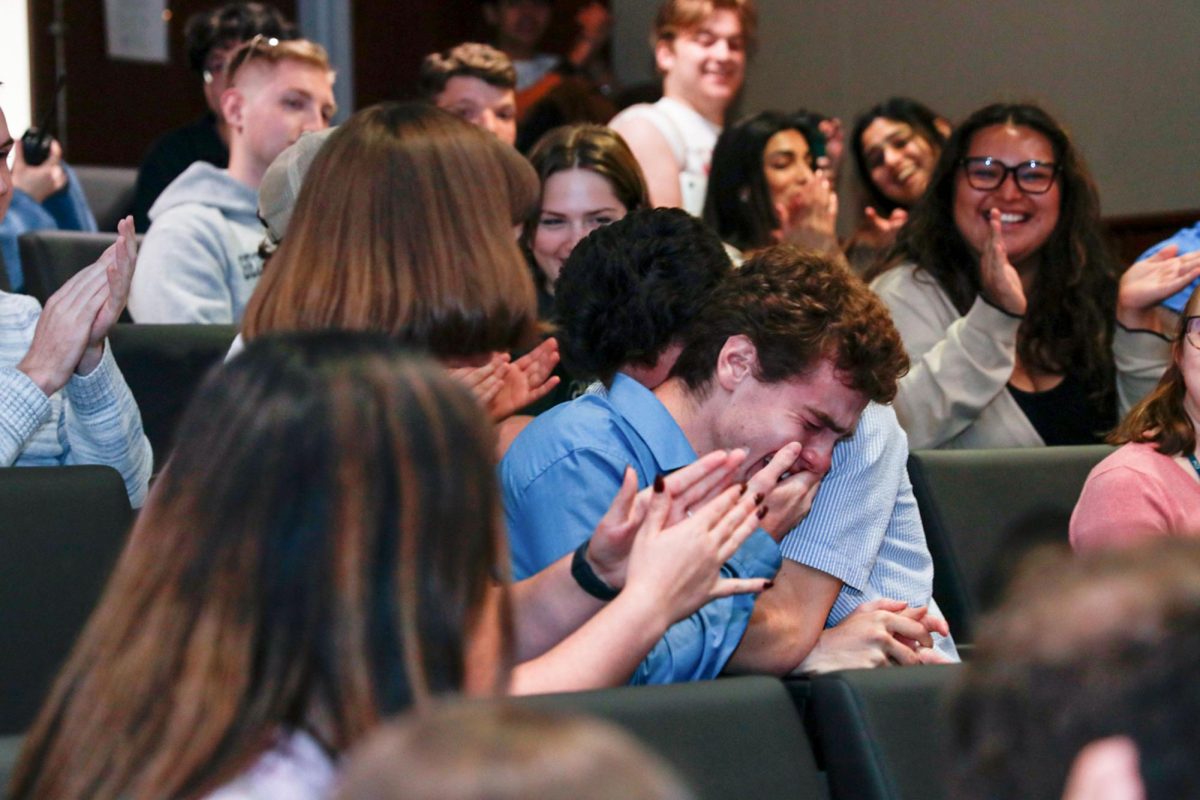 SGA Sen. Ethan Fitzgerald (CCAS-U) reacting to his win in the University Student Center Amphitheater. 
