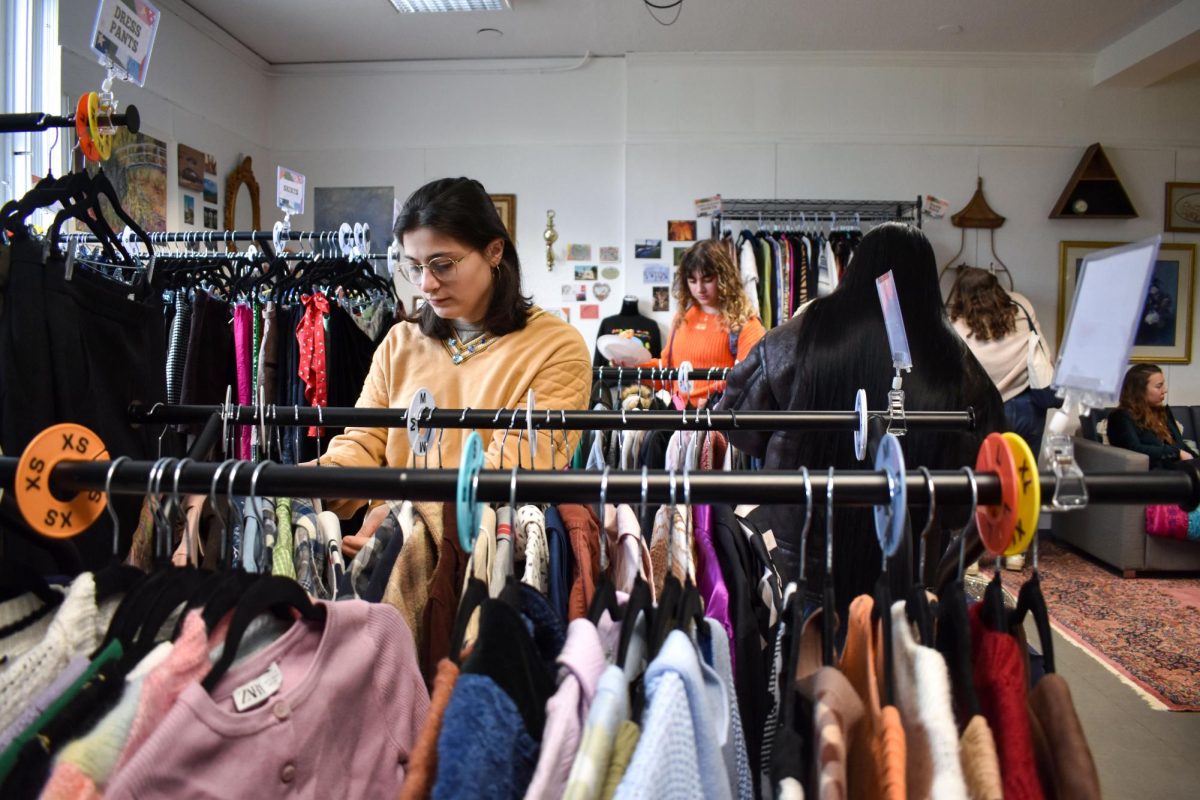 Students browse clothes at The Loop pop-up shop earlier this month.