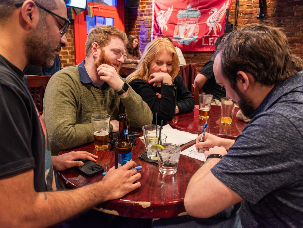 Patrons sit stumped by Tuesday night trivia at Exile.
