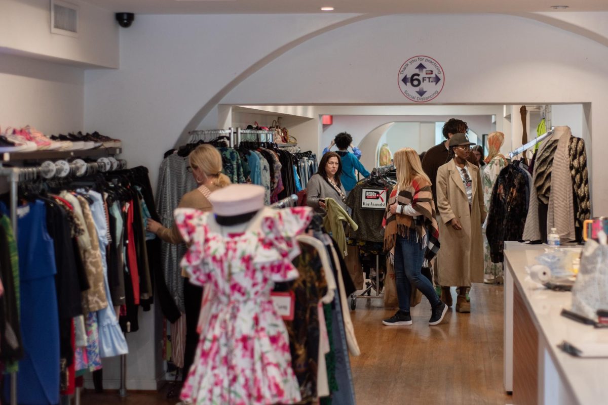 Customers peruse the racks of vintage finds at Reddz Trading.