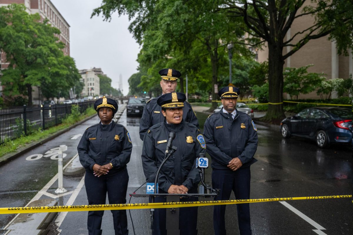 Metropolitan Police Department Second District Commander Tatjana Savoy speaks at a press conference outside of the Columbia Plaza Apartments on Saturday. 