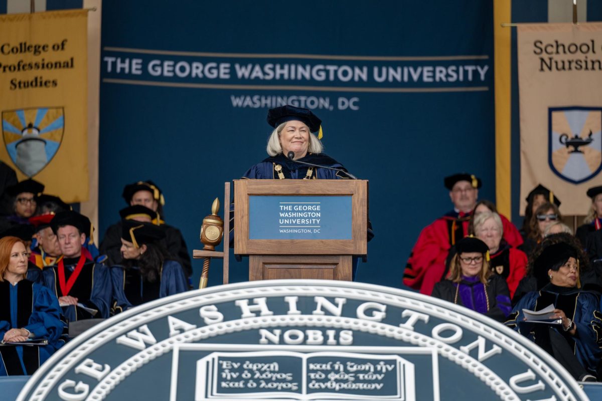 University President Ellen Granberg speaks before the graduating class of 2024 on the National Mall at GWs Commencement.