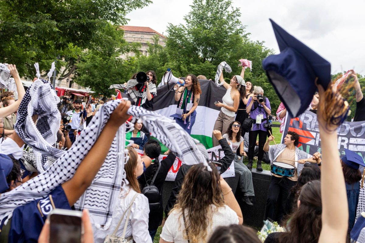 Students, graduates and demonstrators gathered in front of the National Museum of African American History and Culture to protest GWs 2024 Commencement.
