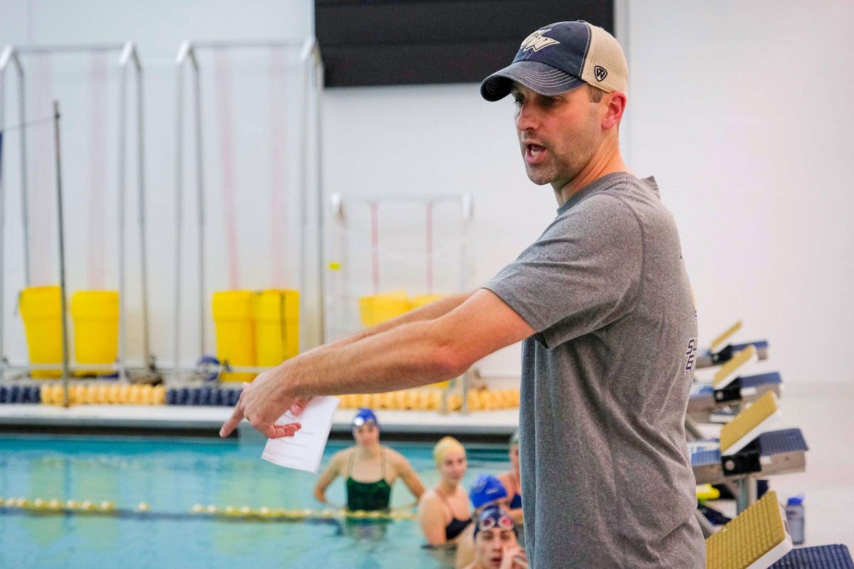 Swim Coach Brian Thomas coaching players in 2018. 