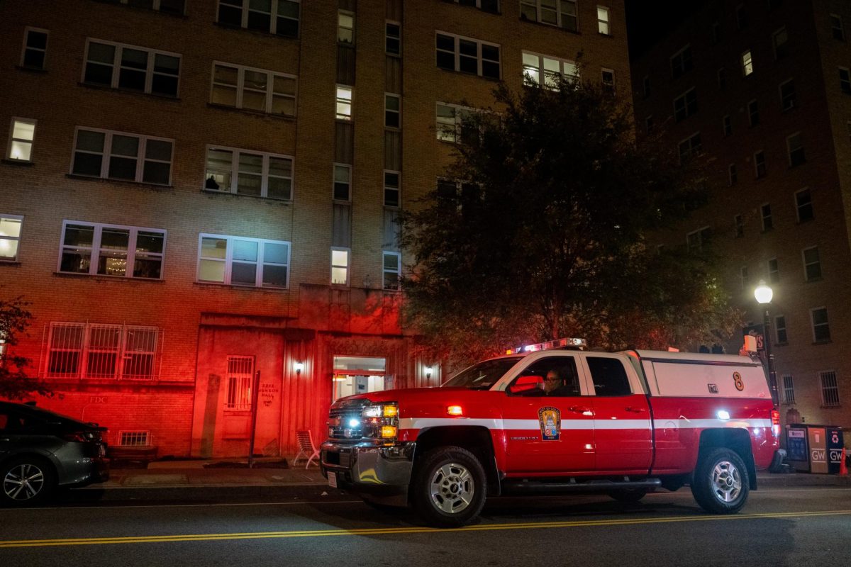 A Washington D.C. fire command unit parked on I Street in front of Munson Hall.