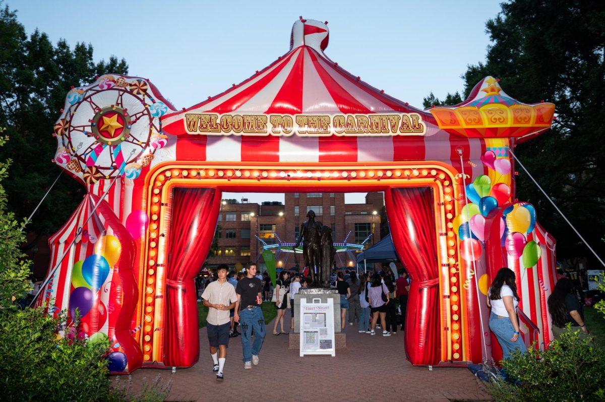 The entrance to University Yard receives a carnival makeover for Saturday's First Night Festival.