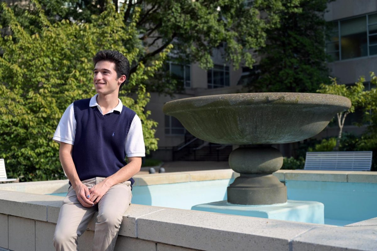 Student Government Association Sen. Jacob Wilner (CCAS-U) sits in Kogan Plaza.