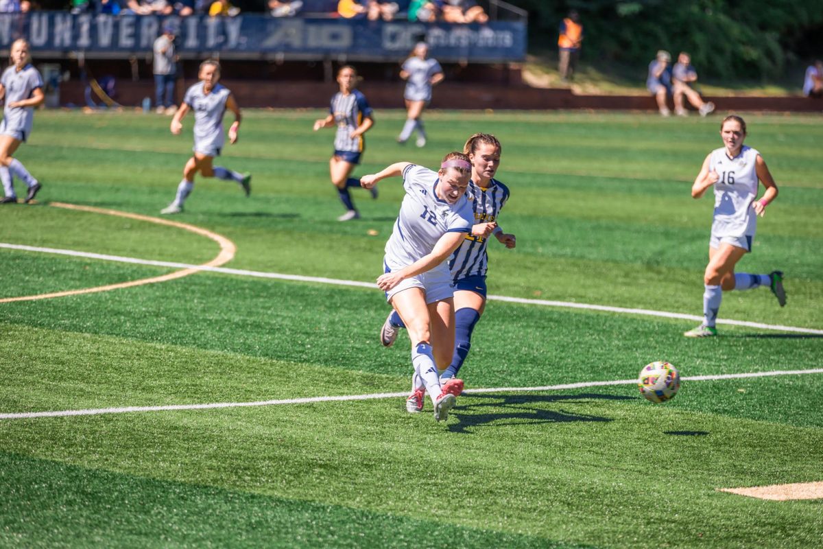 Senior defender Maggie Mockenhaupt defends the ball from a Drexel player. 