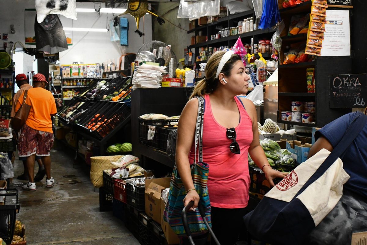 Shoppers peruse Mexican Fruits located in Union Market. 