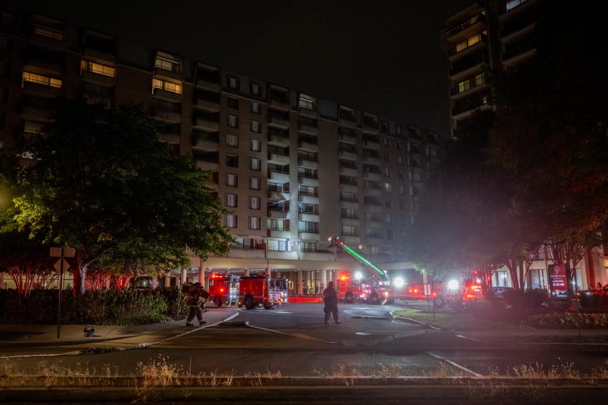 Fire crews respond to a fire on the fifth floor of Columbia Plaza Apartments Monday night. 