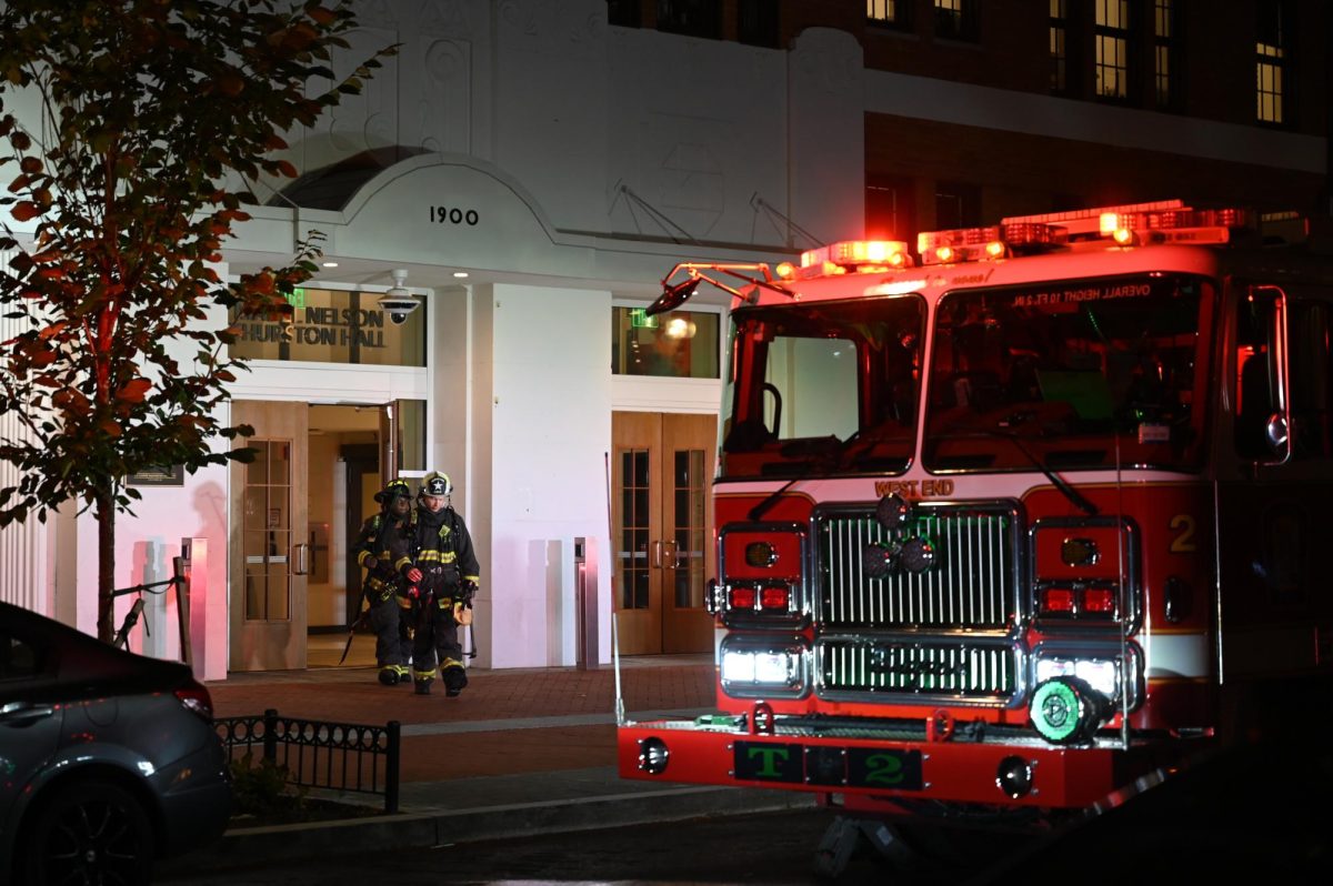 D.C. Fire and Emergency Medical Services personnel leave Mabel Nelson Thurston Hall after responding to a report of smoke.