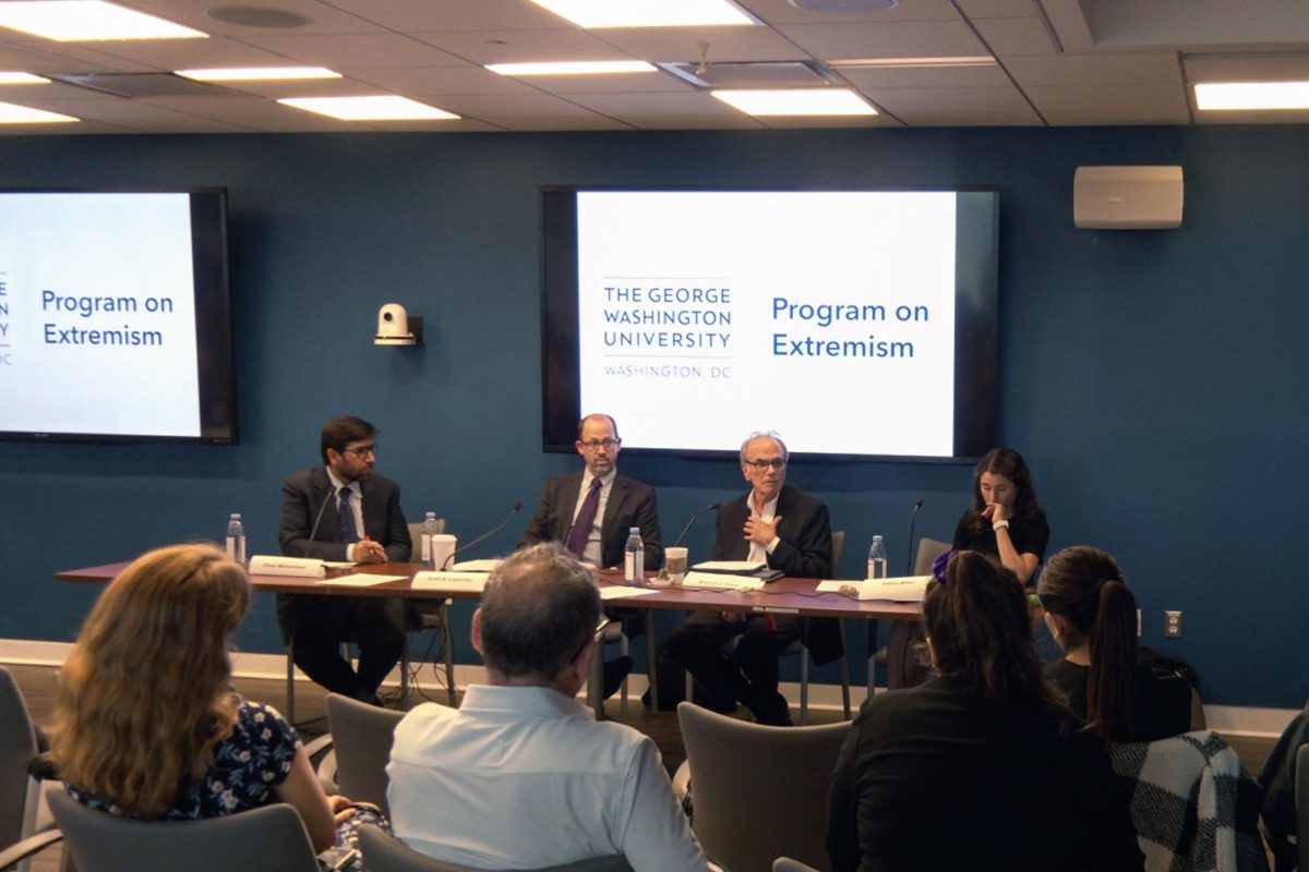 Dean of the Graduate School of Education and Human Development Michael Feuer addresses the audience during Tuesday's panel.