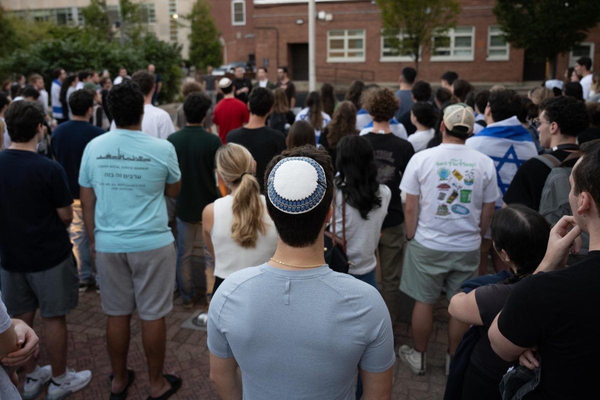 A student wearing a yamaka attends a vigil for six Israeli hostages killed by Hamas last month.