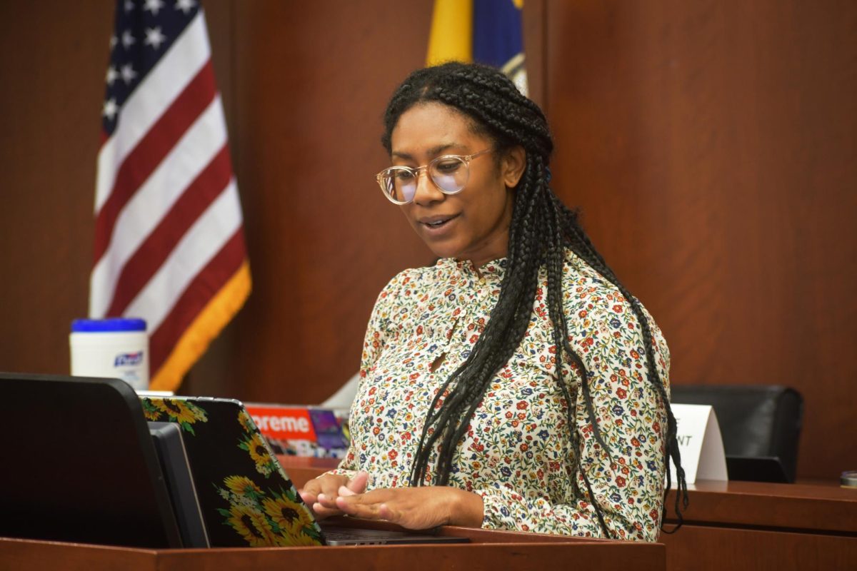 Student Bar Association President Cherissa Lindsay delivers remarks during Tuesday's meeting.