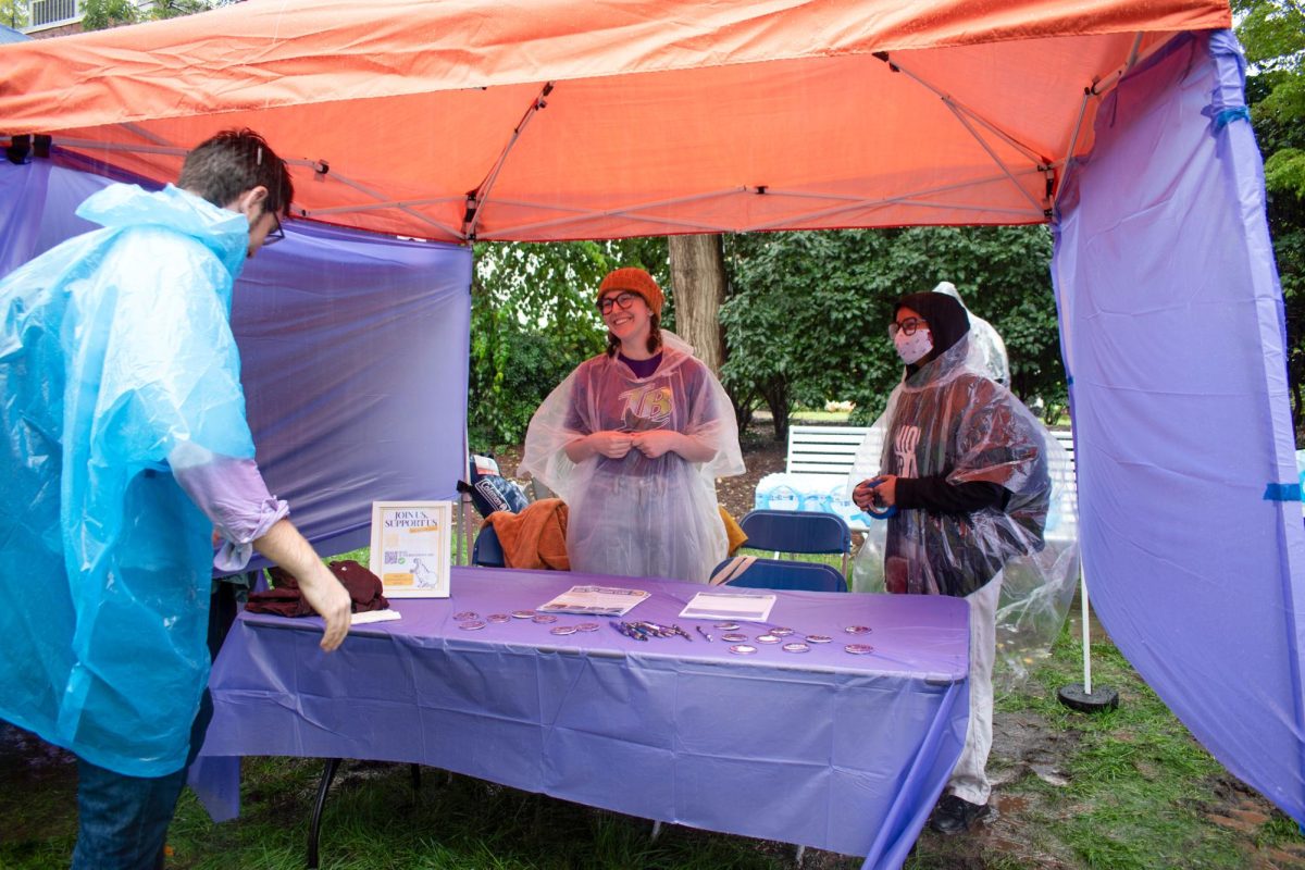 Members of the Graduate Workers Union promote the organization and pass out merch during the public launch.