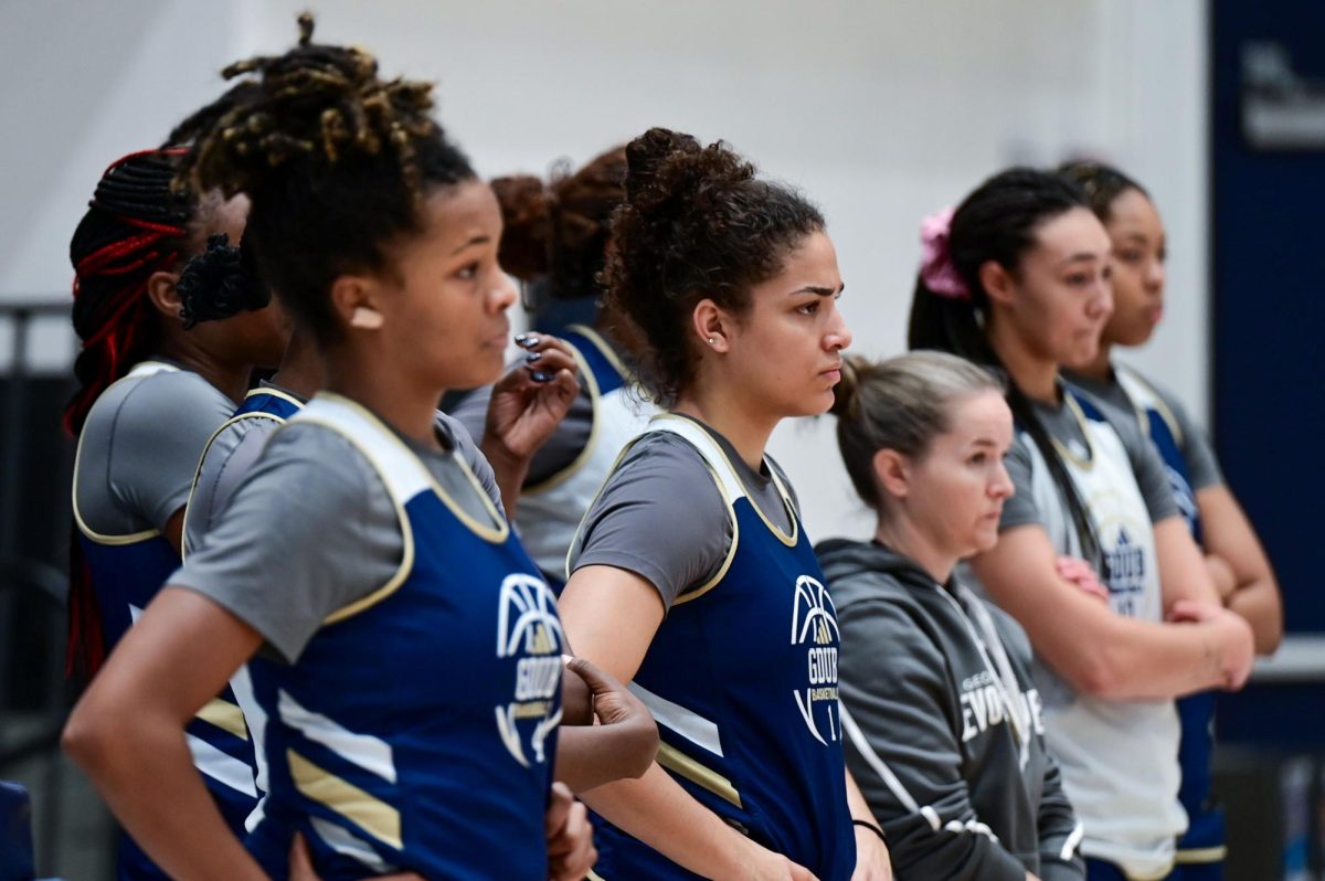 Members of the women's basketball team watch their teammates during a practice last week.