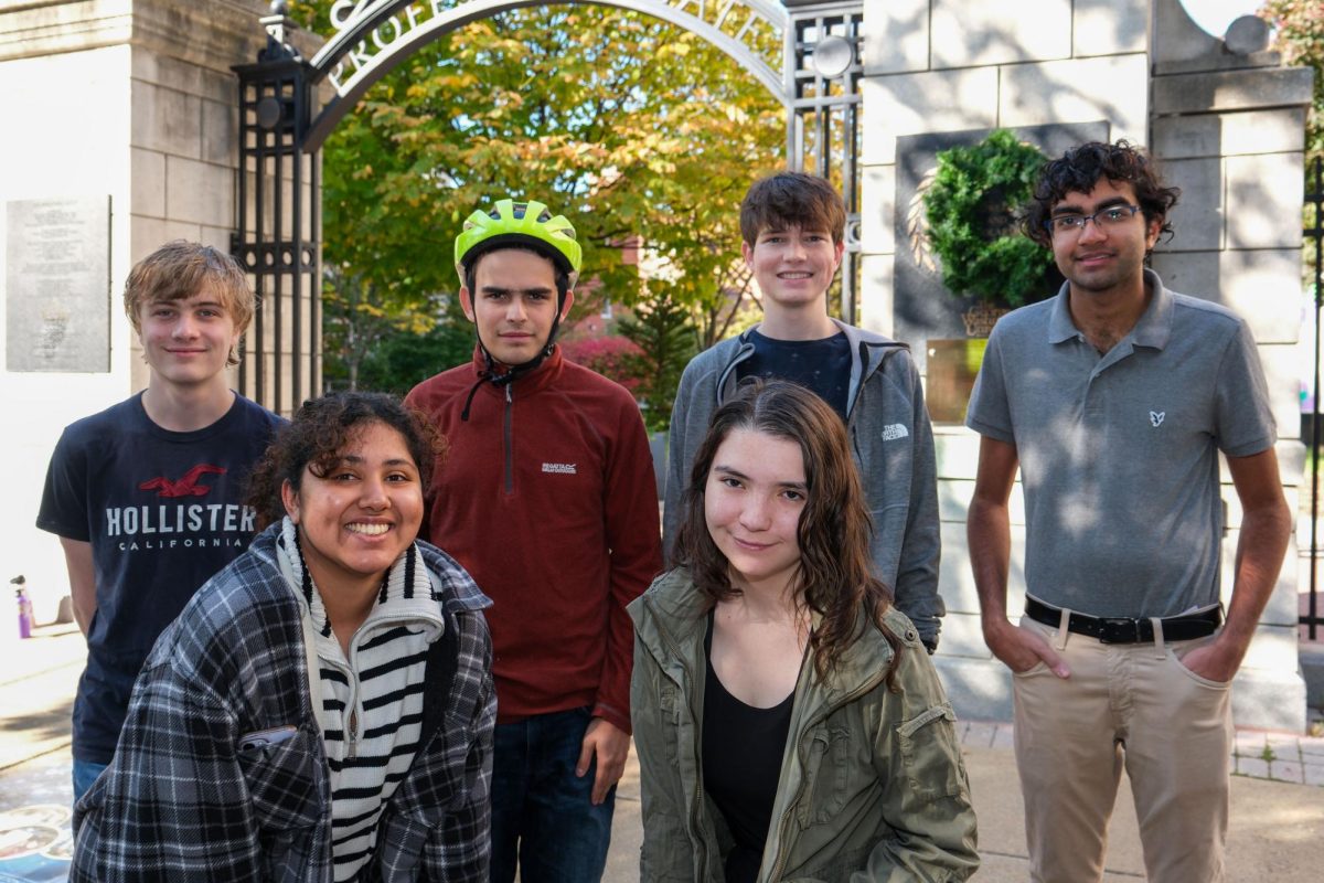 Members of the GW Biking Club pose for a portrait in front of Kogan Plaza.