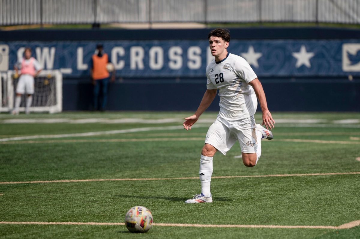 Sophomore midfielder Ben Hissrich drives the ball down the field during a match against Duquesne last month.