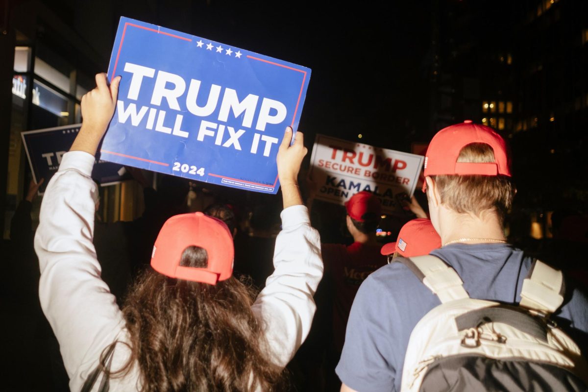 Members of GW College Republicans march toward the White House on election night.