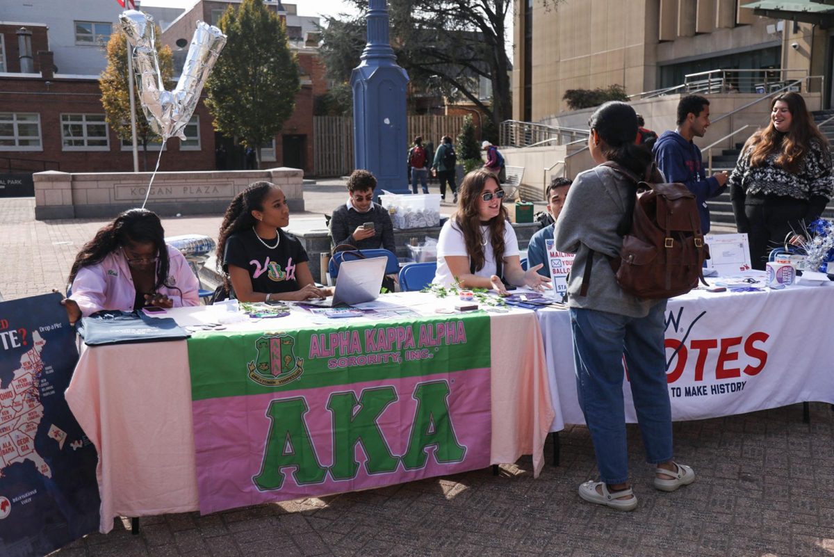 Members of Alpha Kappa Alpha and GW Votes table in Kogan Plaza to encourage voting ahead of the 2024 election.