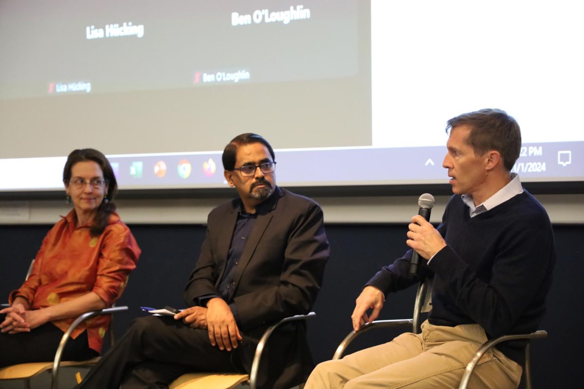 From left to right, Susan Benesch, Vasu Mohan and Theo Dolan speak on preventing election violence.