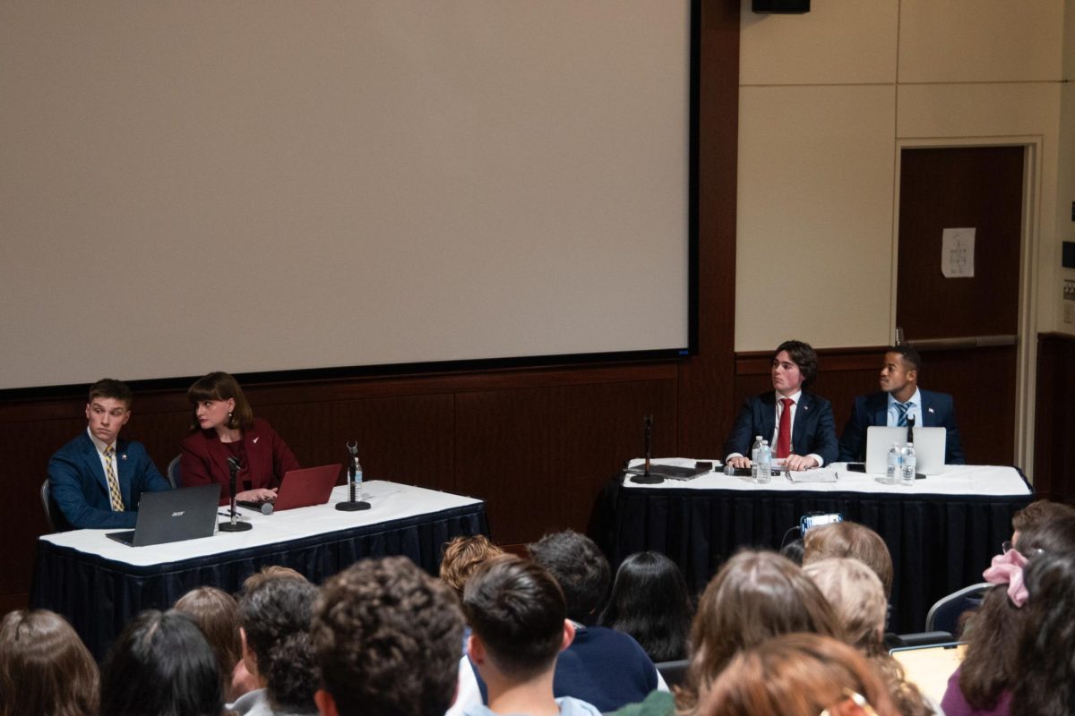 Members of GW College Democrats and GW College Republicans face off in a debate before Election Day.