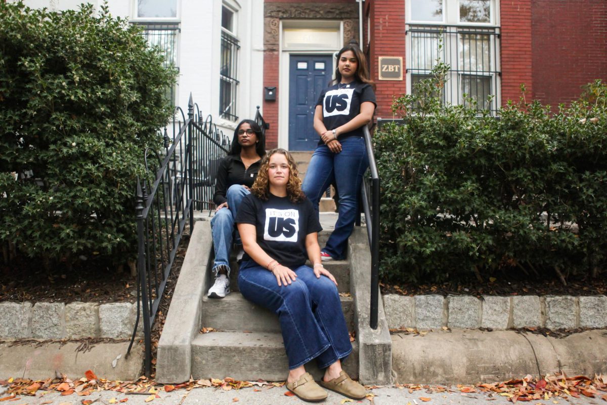 Members of the It's On Us at GW executive board sit for a portrait at the townhouses on 22nd Street. 