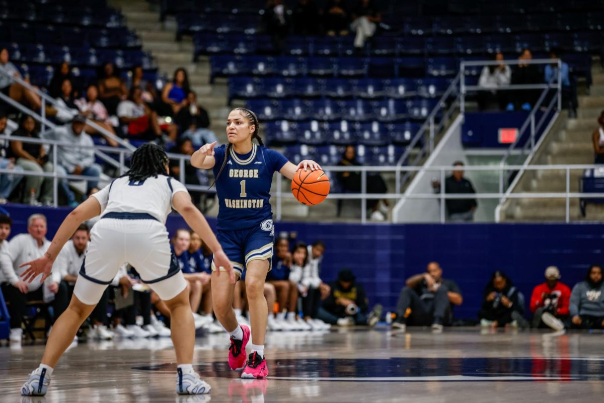 Freshman guard Gabby Reynolds signals to her teammates to prepare for a pass during Friday's game against Howard.