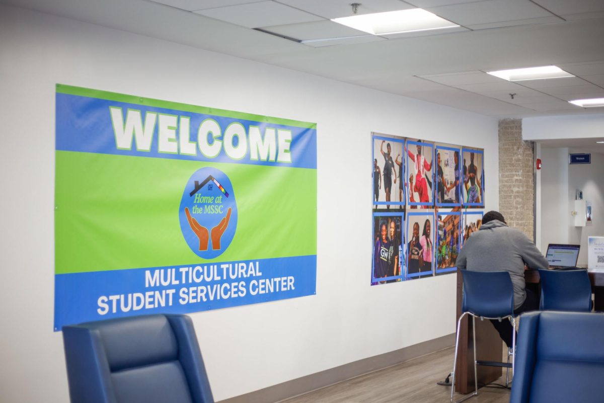 A sign welcoming students to the new Multicultural Student Services Center hangs in the fifth floor of the University Student Center.