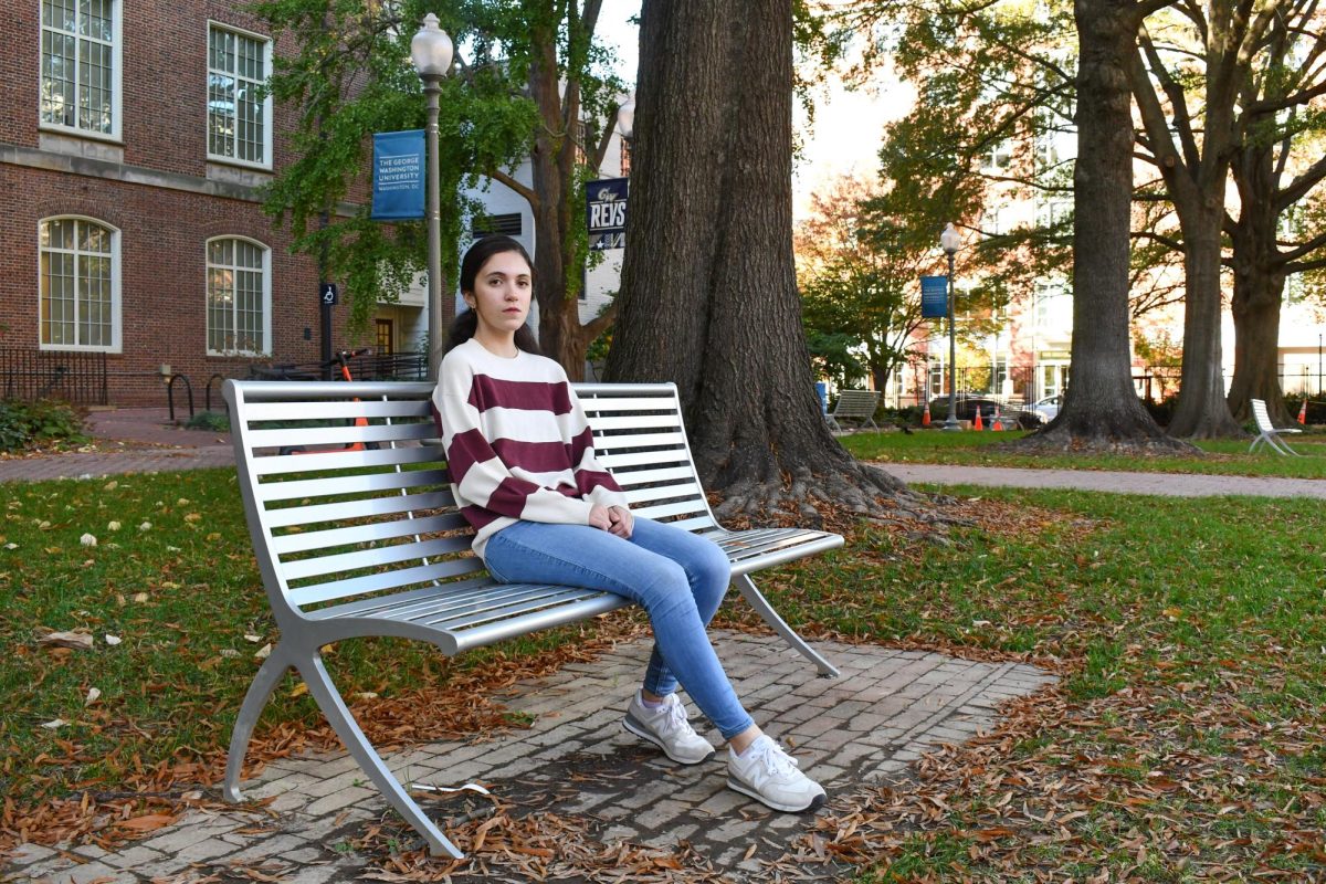 Emily-Anne Santiago poses for a portrait in University Yard.