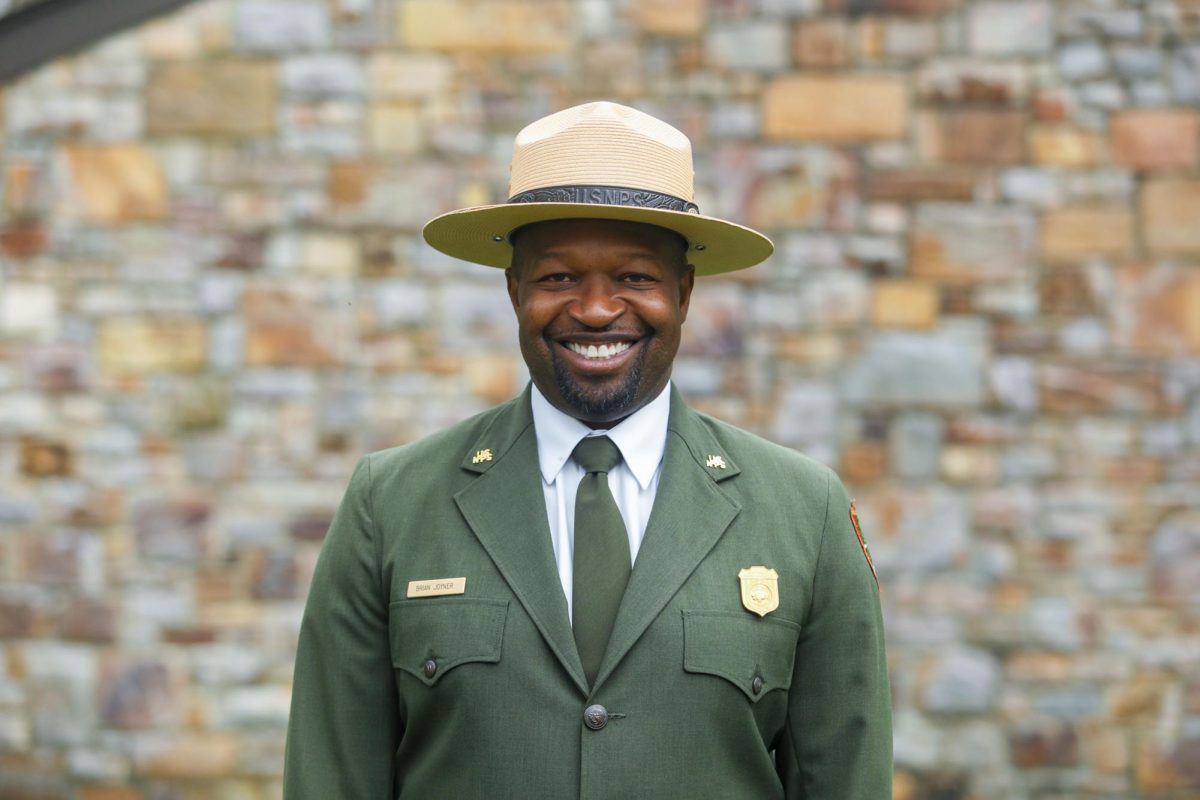 Former GW student Brian Joyner smiles in uniform as the new superintendent of Rock Creek Park.