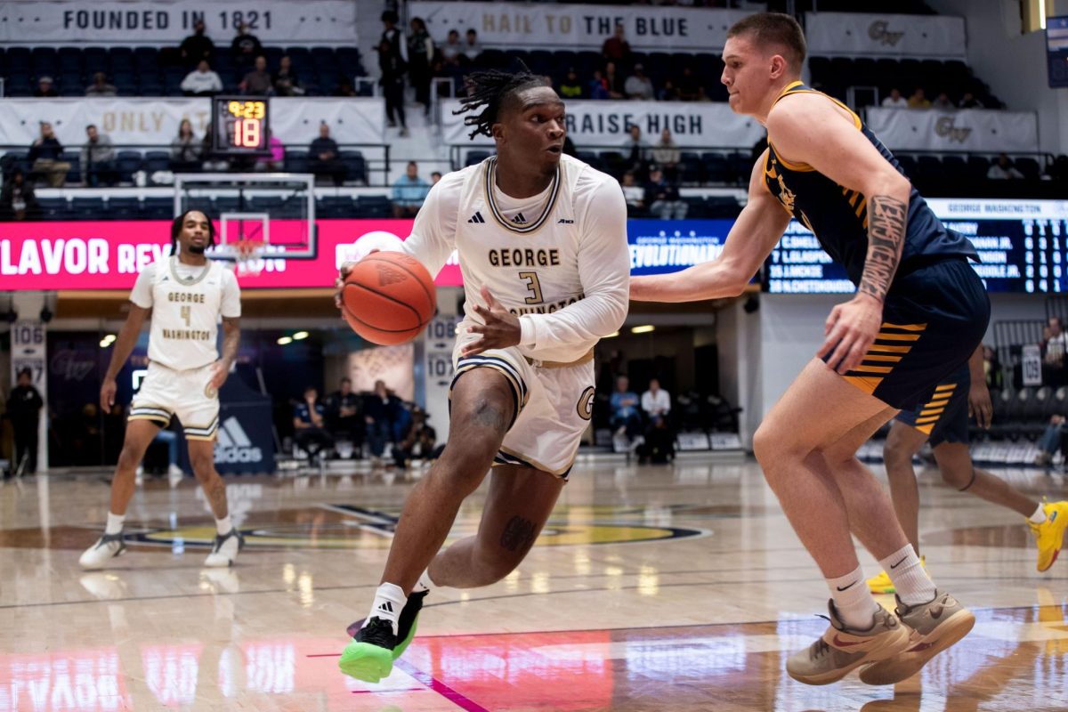 Redshirt sophomore forward Darren Buchanan Jr. drives past a opponent during a game against NC A&T tonight.