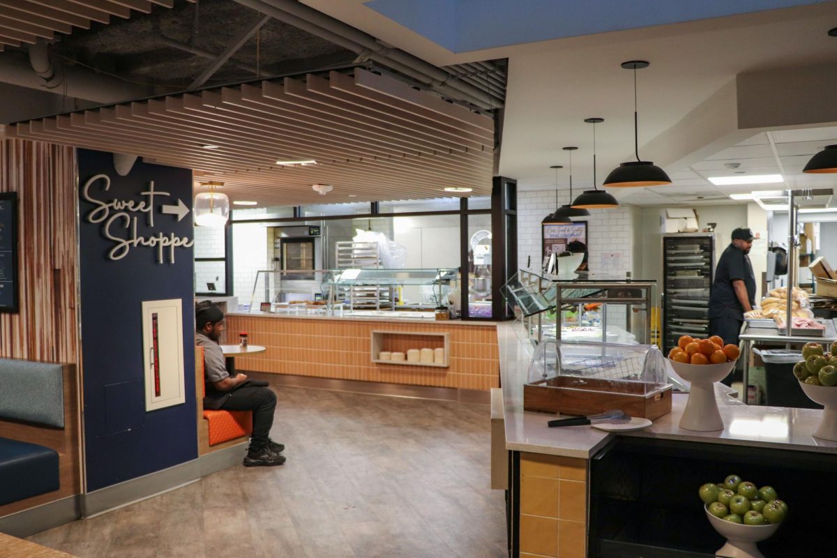 Employees prepare food in Thurston Dining Hall.