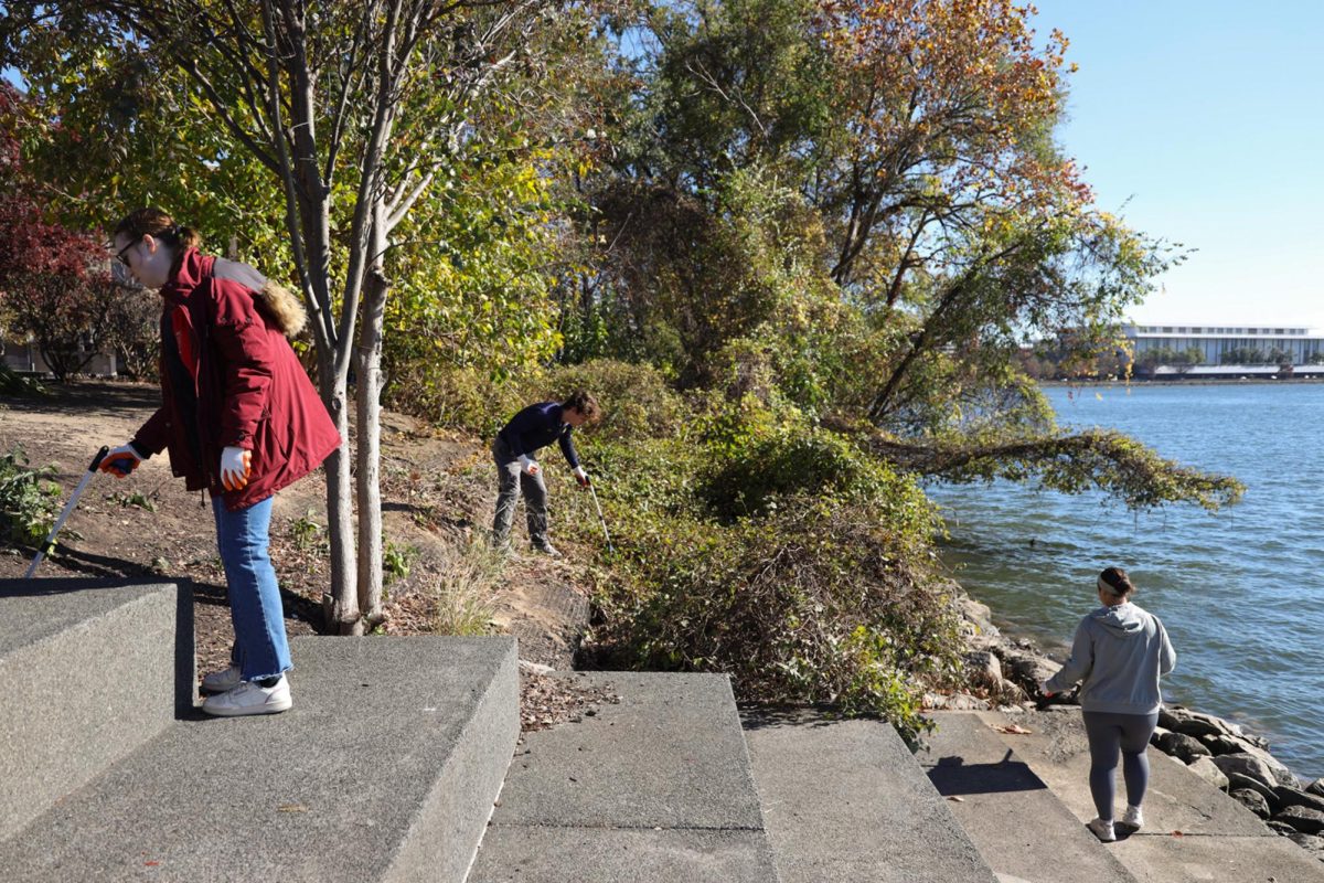 GWU Surfrider Foundation Club members pick up trash along the Potomac River at the Georgetown Waterfront. The GWU Surfrider Foundation Club, a chapter of the non-profit Surfrider Foundation, hosts monthly trash pick-ups for GW students to join in and uphold their mission of keeping D.C. waterways clean.