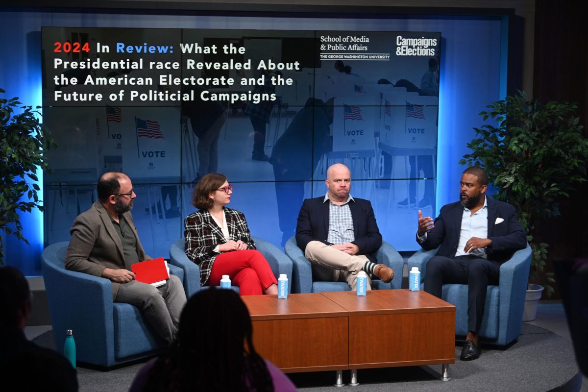 Members of the panel look toward Rodell Mollineau, co-founder of Rokk Solutions, as he offers his insights into the future of political campaigns.