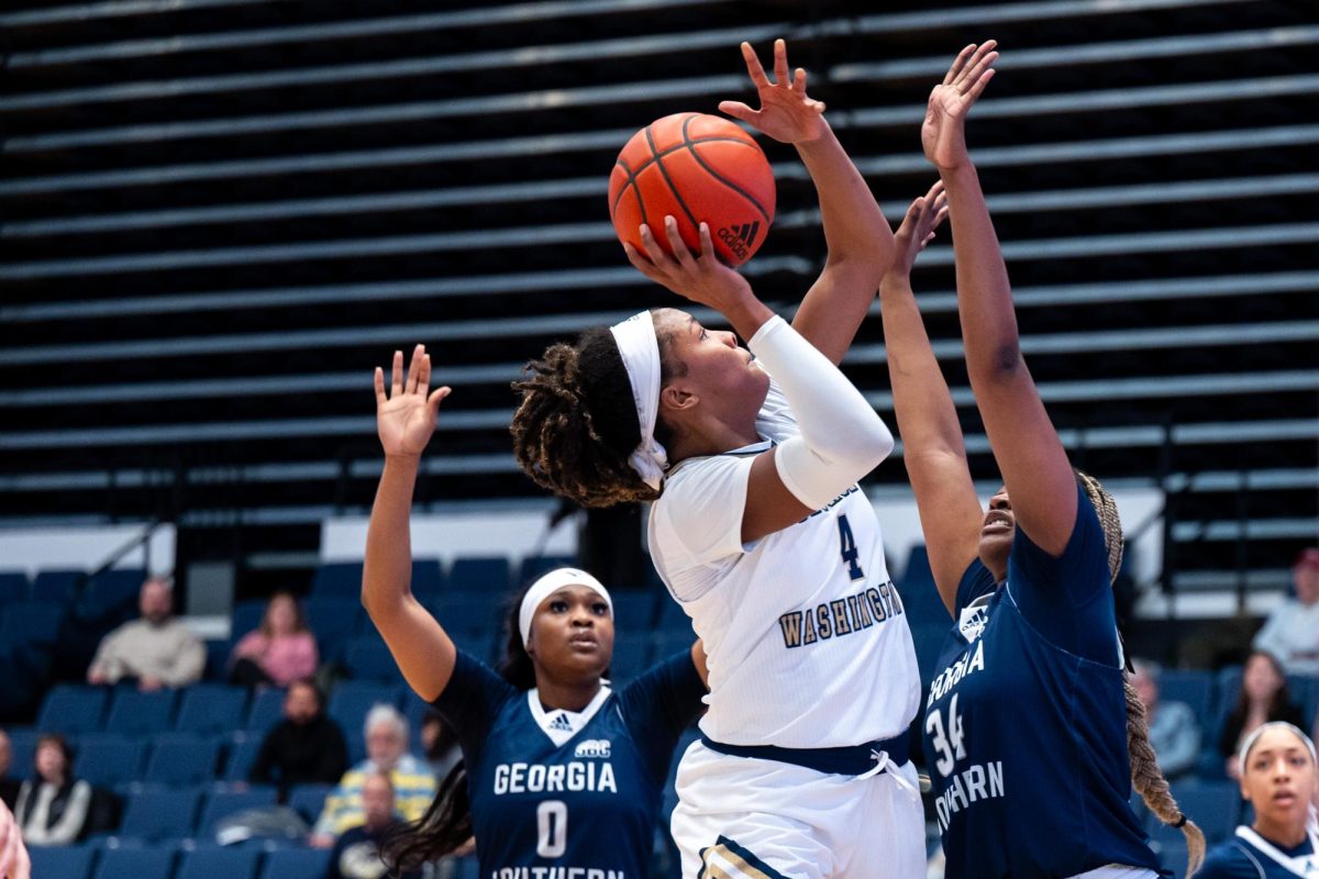 Sophomore forward Sara Lewis  shoots a basket during a game against Georgia Southern this week.