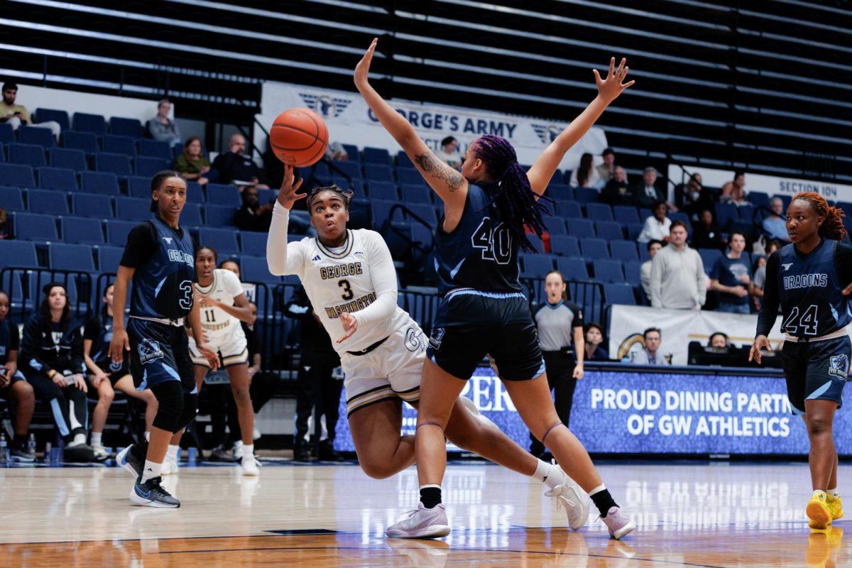 Freshman forward Miriam Diala shoots a basket during tonight's game against Virginia - Lynchburg.