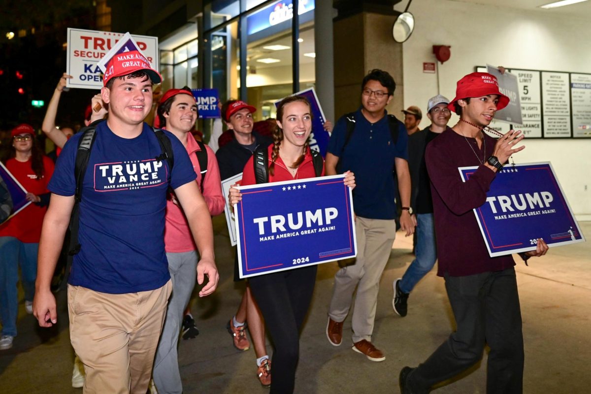 The GW College Republicans, along with chairwoman Victoria Carlson, march towards the White House after Trump's victory in Pennsylvania. 