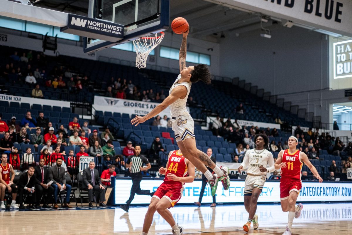 Redshirt junior guard Trey Moss shoots a basket during the game against VMI this week.