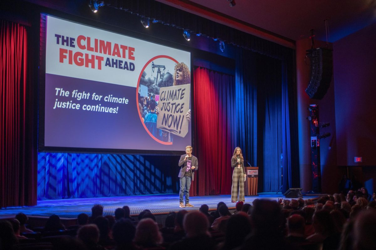 Jamie Henn and Cassidy DiPaola of Fossil Free Media deliver their opening remarks as MCs for the event.