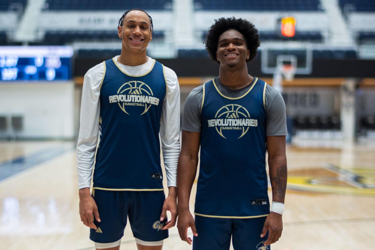 Redshirt junior forward Rafael Castro and redshirt sophomore forward Darren Buchanan Jr. pose for a portrait in the Smith Center.